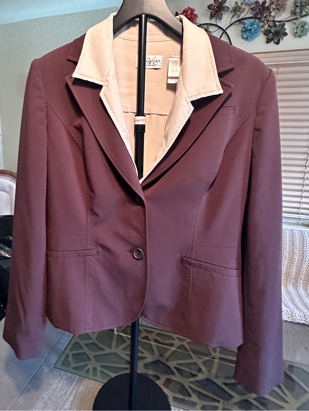 Style & Co. Brown blazer sits below the waist.